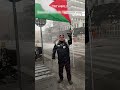 swedish man on crutches braves snow to protest for palestine