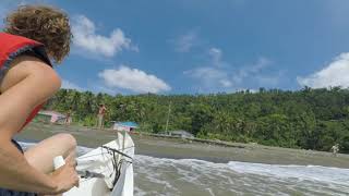 Arriving on the beach with a surf