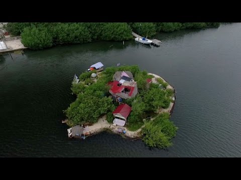This Man Lives On An Island Paradise... Floating On Trash