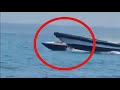 Moment Spanish police boat chases runs migrant dinghy