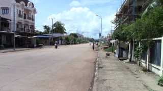 walking on a street in Savannakhet, Laos #3 of 3