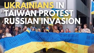 Ukrainians sing anthem outside Russia's Taipei office