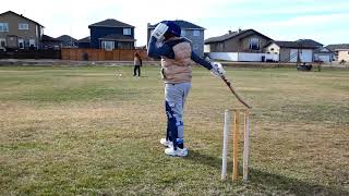 11 year old son batting on off and on side--Playing at Bankview grounds-Drumheller, AB