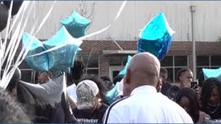 Families and friends honor three men murdered last week