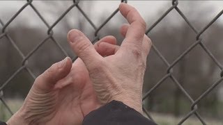 Woman clings to stranger, prevents him from jumping off bridge