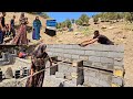 Rural family routine.  Babak is building a new terrace and the children are helping him