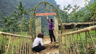 single girl with stupid guy, building gate and signboard for bamboo house, poor life girl and boy