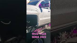 Show truck at SEMA 2022, sparkle custom paint job on a lifted high 4x4. How did they do it?