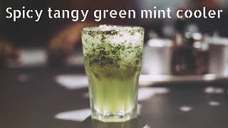 Spicy tangy green mint cooler cocktail