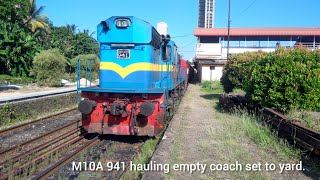 M10A 941 hauling empty coach set to yard.