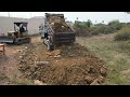 new project landfilling dump truck unloading stone technique skill operator bulldozer working push.