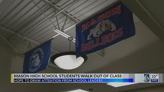 Mason High School students walk out of class