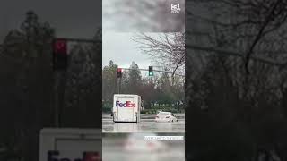 FedEx driver helps rescue driver stuck in floodwaters in Sacramento County