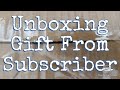 Unboxing a gift from a subscriber