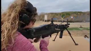 Jennifer Holcomb firing M60E4 belt-fed machine gun