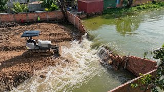 Small Bulldozer Pushing Dirt Complete The Land Inside The Wall And Coverage Water