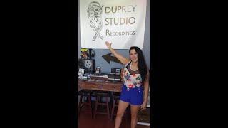 Rachel Delgado singer songwriter behind the scenes at Duprey recording studios having fun
