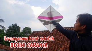 Cara mengatasi layangan berat sebelah,