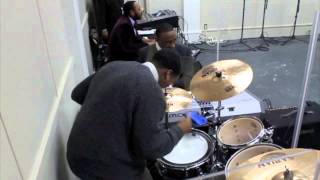 Drummer Shouting and Playing