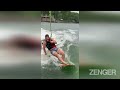 swan wake angry swan attacks hapless wake surfer