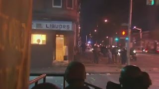 Liquor store on fire, chaos on Baltimore streets