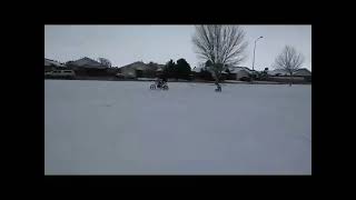 Snow sledding, on the KLX, with Aaron...