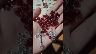 saint Michael rosary in maroon crystal glass