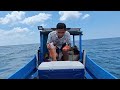 fishing and grilling sultan fish on a boat it really feels delicious