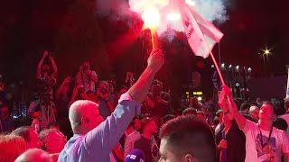 Kyriakos Mitsotakis supporters celebrate after landslide election win | AFP