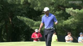 Tiger Woods holes a putt for eagle in Round 2 of 2012 AT&T National