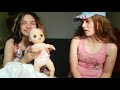 cammi and ryley open a surprise box from baby alive