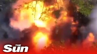 Ukrainian drone drops bomb on Russian soldiers blowing up in MASSIVE explosion