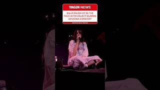 Fans are fuming after someone threw a bracelet at #BillieEilish while she was onstage performing!