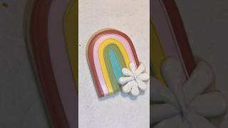 Decorating groovy rainbow cookie with royal icing. #decoratedcookies #cookies #cookiedecorating