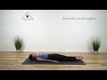 supta udarakarshanasana lying abdominal stretch pose