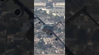 Bold! A large C-17 is running below eye level, U.S. Air Force, Nellis Air Force Base.