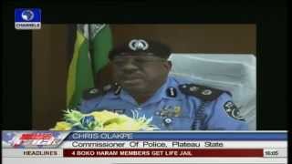 Two Plateau police officers dismissed for gun running