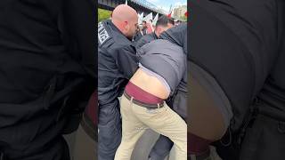 A supporter is arrested during a forceful intervention by Berlin police at the Nakba protest for Gaz