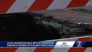 Local businesses deal with aftermath of sinkhole opening up in downtown Omaha