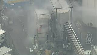 Authorities urgently try to stop California chemical tank explosion