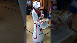 Watch how robot waitress serves food