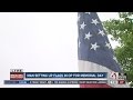 JoCo volunteers set up flags in Overland Park for Memorial Day