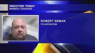 Rape suspect charged with bribery