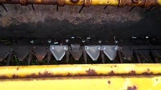 Replacing cutters on the New Holland haybine.