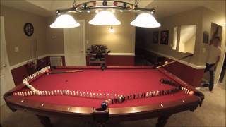 Awesome billiards trick shot using Dominoes