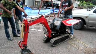 Kobelco-SS1 with temporary rubber track.