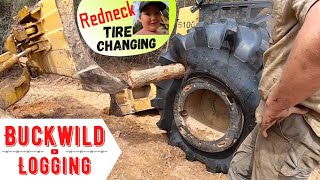 Redneck Tire Changing with a Loader & Dozer