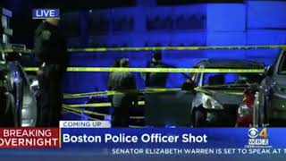 Boston police officer calls into dispatch after officer shot in gunfire exchange with suspect