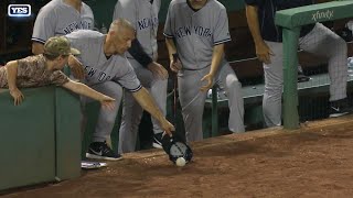 NYY@BOS: Girardi snags a foul ball with his hat