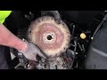 Flywheel removal on a 23hp Kawasaki engine; no puller needed.